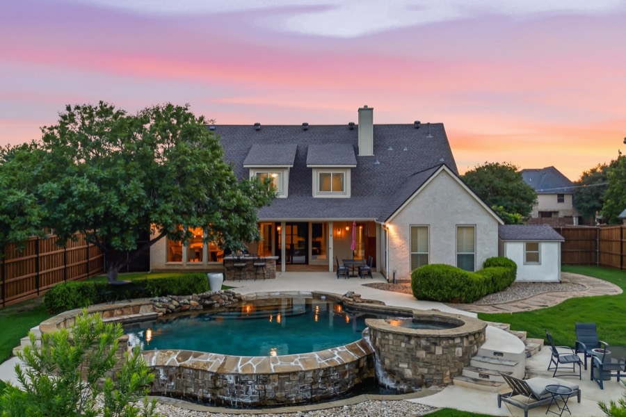 Twilight pool and patio in Colleyville